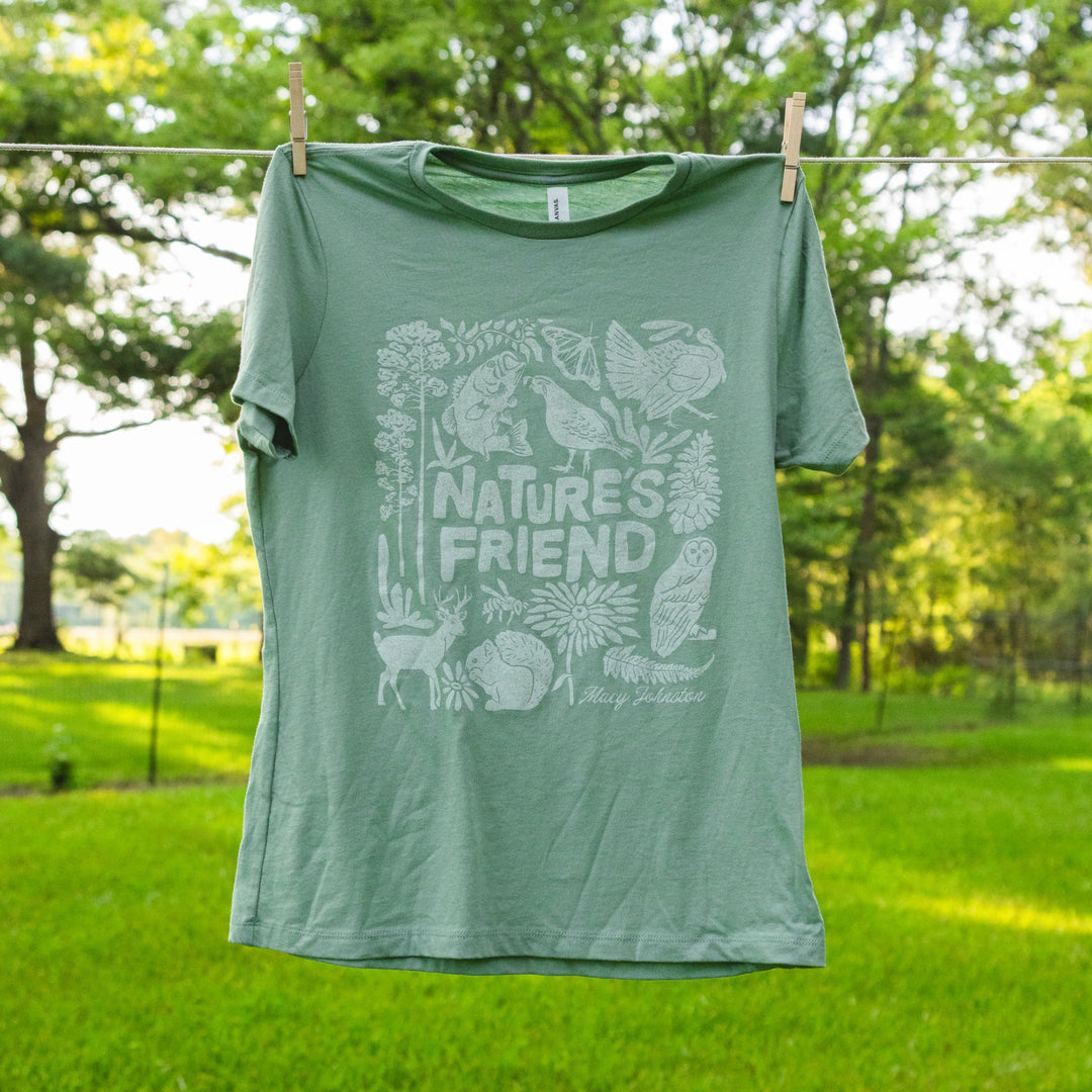 Sage green crewneck t-shirt with Macy Johnston's Nature's Friend outdoor critter graphic print